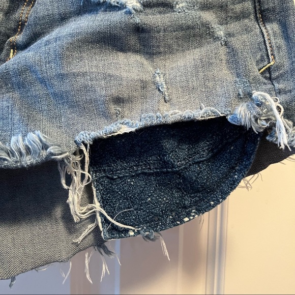 American Eagle Distressed Cutoff Denim Shorts with Exposed Pockets - Picture 3 of 5
